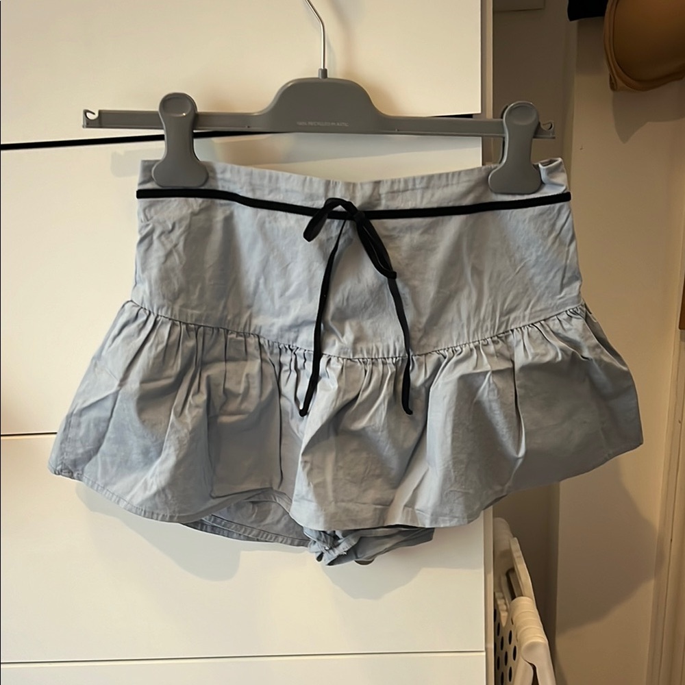 blue skort with velvet string bow